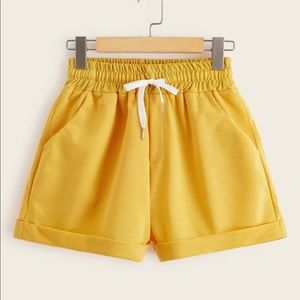 Yellow drawstring waist shorts